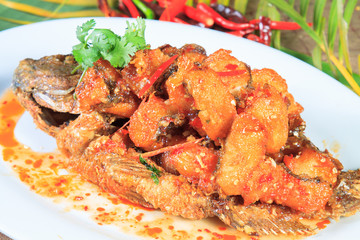 Thai food style: Fried fish toppted with chilli sauce