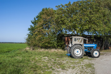 Old tractor on the field