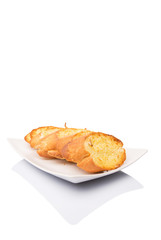 Homemade garlic bread of French baguette slices