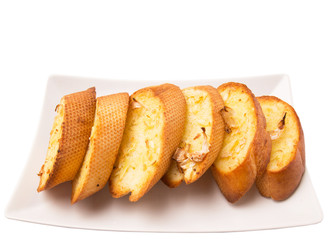 Homemade garlic bread of French baguette slices 