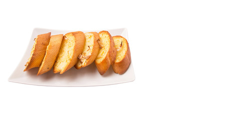Homemade garlic bread of French baguette slices 