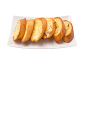 Homemade garlic bread of French baguette slices 