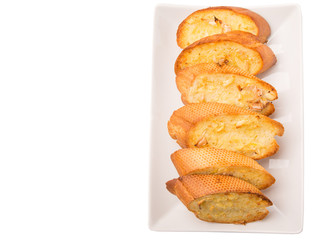Homemade garlic bread of French baguette slices 