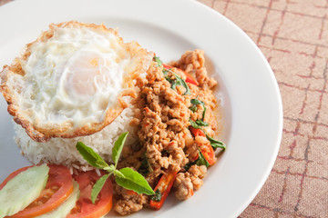 Thai Food Style: Rice topped with stir-fried pork and basil