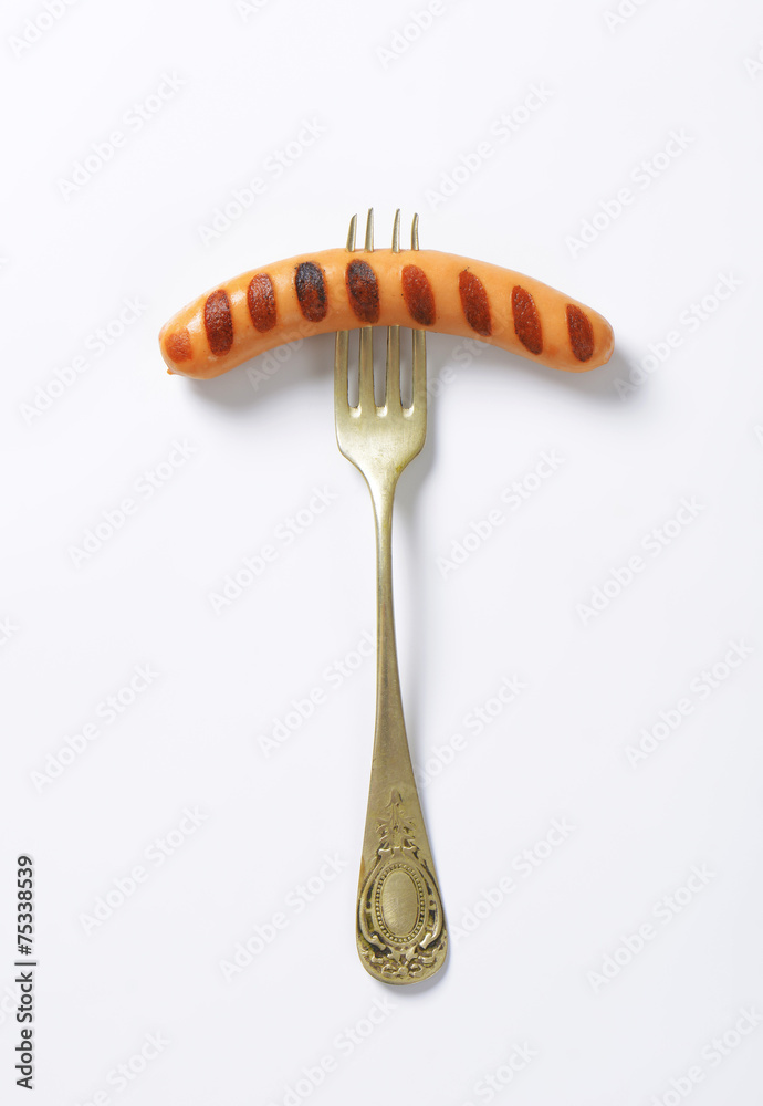 Canvas Prints Grilled sausage on fork