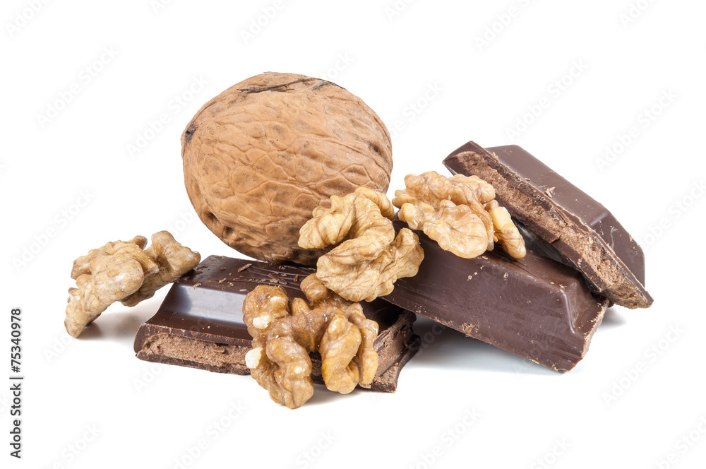 Wall mural Chocolate pieces and walnuts on white background - Wall murals