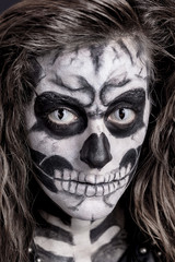 Women painted as skeleton