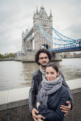 Loving couple in front of Tower Bridge - London