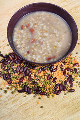 top view of beans soup in bowl on plate