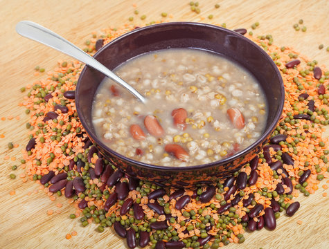 mess of pottage in bowl with tablespoon on plate