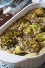 Broccoli casserole with eggs and spices macro rustic. Vertical