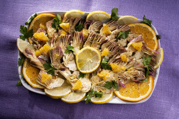 plate of raw marinated artichokes
