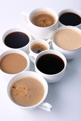 Lots of coffee cups on white background