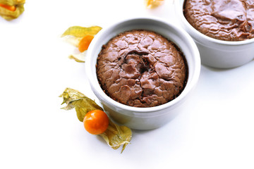 Hot chocolate pudding with fondant centre on white table