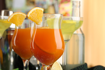 Glasses of fruit cocktails in party close-up