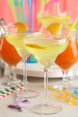 Glasses of fruit cocktails in party close-up