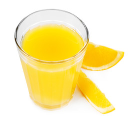Glass of orange juice with slices isolated on white