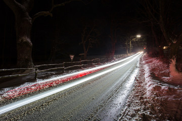 snowy street at night