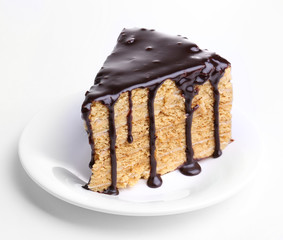 Chocolate cake on white table