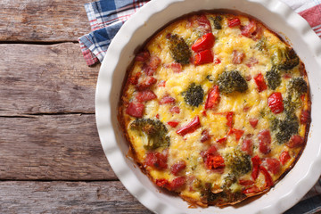 quiche with broccoli, pepper, bacon. horizontal top view