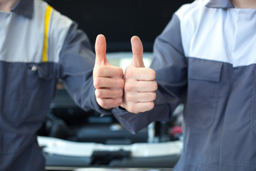 two car mechanic hands