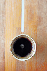 close up hot espresso on wooden table