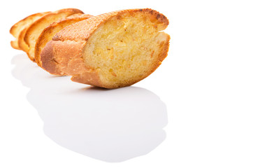 Homemade garlic bread of French baguette over white background