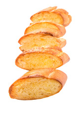 Homemade garlic bread of French baguette over white background