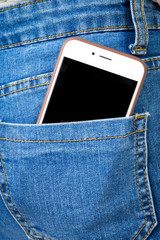 Cell phone in back pocket of girl's jeans