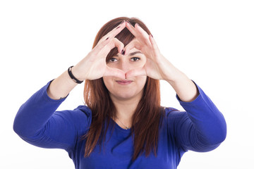 Girl doing heart with her hands