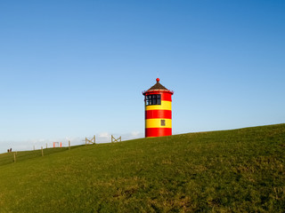 Pilsum, lighthouse at North sea of Germany.