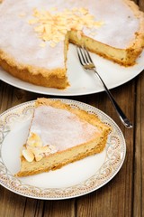 Banana tart piece on wooden background