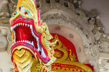 Dragon on gates of the Buddhist temple in Bangkok, Thailand