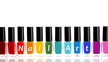 Colorful nail polishes, isolated on white