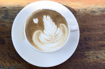 Hot latte coffee in white cup