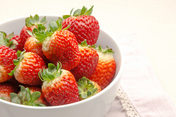 Several fresh strawberries