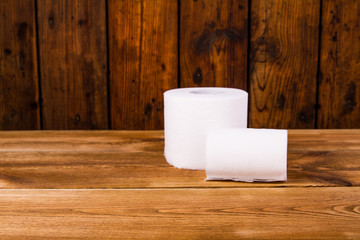 Toilet paper on a wooden table