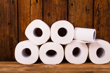 Toilet paper on a wooden table