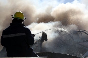 Fireman Putting Out Fire