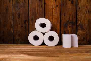 Toilet paper on a wooden table