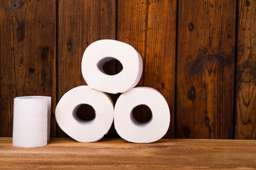 Toilet paper on a wooden table