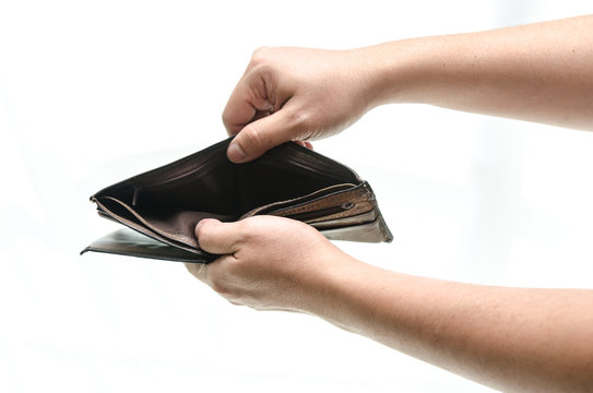 Empty wallet in male hands