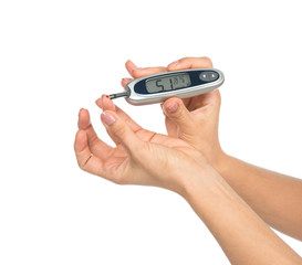 Diabetes composition glucometer in hand for measuring glucose le