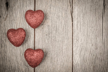 Hearts on Vintage Wood Background for Valentine's Day