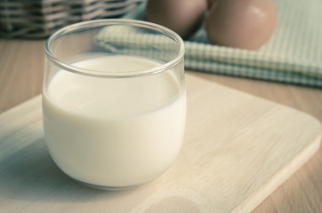 Close up glass of milk onwooden table