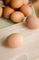 Close up of eggs on wooden table