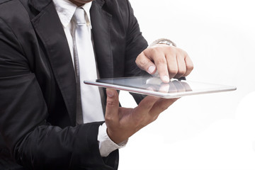 business man working on computer tablet touching screen with whi