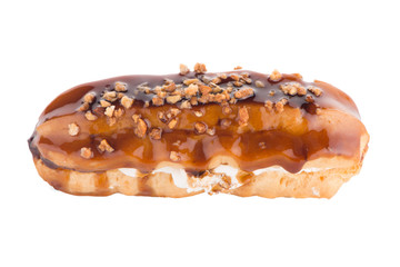 Eclair with caramel decoration