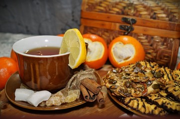 Tea with spices,fruits,sweets ,Valentine's Day in the kitchen