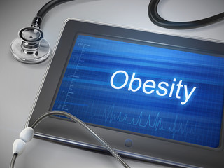 obesity word displayed on tablet